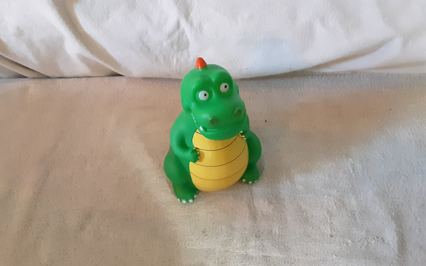 Dinosaur coin bank